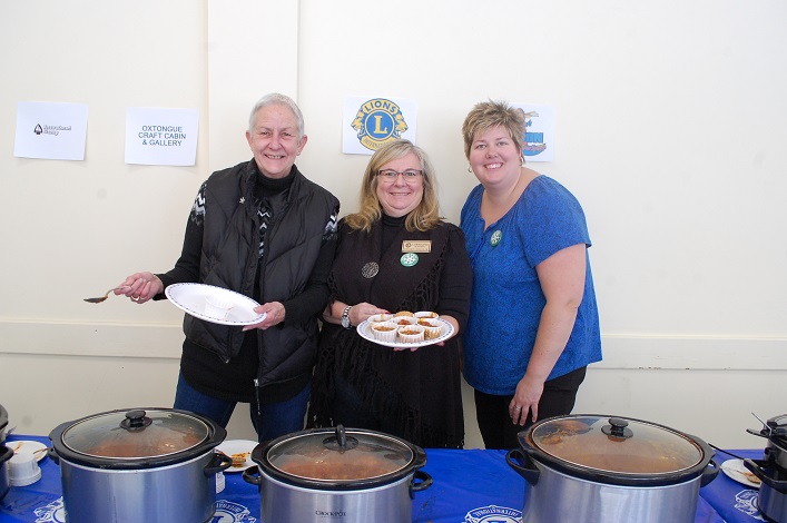 (From left) Jean Hall, Lorraine Blondin and Tanya Grainger serve up samples in the chili cook-off