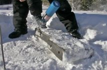Rudi Stade flames the stone during assembly of the bench (supplied0