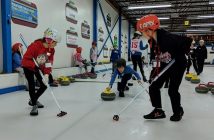 Students learned new skills during the HCC elementary program. (Foreground from left) Addison Watson, Daniel Gamper Smith, and William Morrison put those skills to good use during the bonspiel. (supplied)