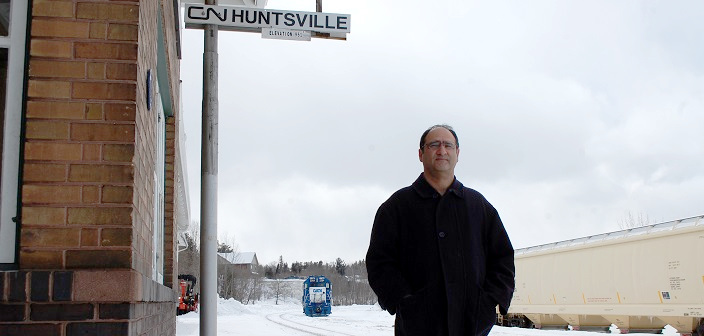 Philip Kashap has suffered health problems thanks to exhaust from the idling locomotive in the background