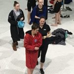 Aidan Spiers and coach Morgan Kierstead on the way to the podium (supplied)