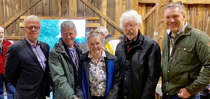 Cutting a celebratory cake are (from left)  District Chair John Klinck, MPP Norman Miller, Patricia Arney, OTF Representative, Dr Norman Yan, FOTMW Chair, and Township of Muskoka Lakes Mayor Phil Harding (supplied)