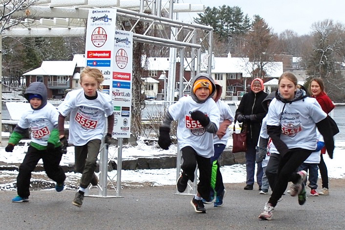 The older age group bursts from the starting area