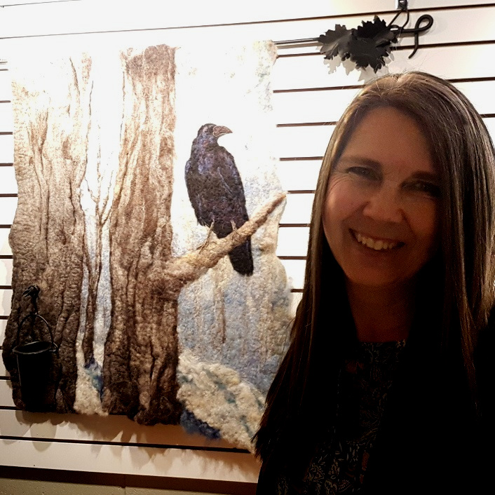 Local fibre artist, Pam Carnochan, was on hand at her show 'Because I Felt Like It' in the Partners Hall Gallery to explain her process to art lovers. The piece behind her, created using dyed wool from her sheep and iron pieces crafted by blacksmith Deb Harkness, is titled 'Sweet Collaboration'. Note the sap bucket on the tree at left.