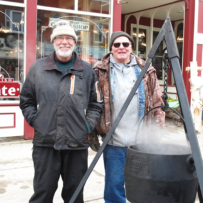 Rick Keevil (left) and Don Ferguson demonstrated how to boil down sap for interested festival-goers