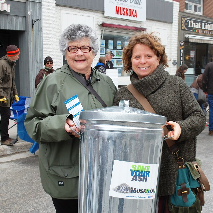Allie Chisholm-Smith (right), with mom Anne Chisholm, took home an ash bucket from the Friends of the Muskoka Watershed as part of a project to use wood ash to help restore calcium levels in local forests