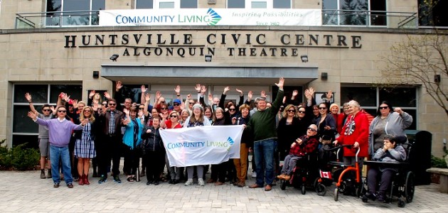 Community Living Huntsville flag raising a reminder that inclusion matters