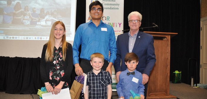 District of Muskoka chair John Klinck (back right) with Smart and Caring Muskoka award recipients (back from left) Lara Memory, Shrey Patel, (front from left) Mitchell Donald, and Heath Parkinson (supplied)