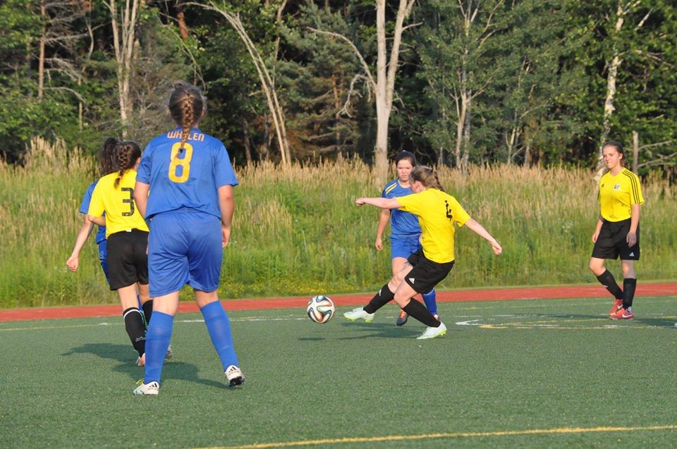 Sophie Small (centre, in yellow) became a top player in just six short years in the game (supplied)