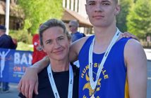 Darla Coles (left) was the top female finisher in the 5k; her son Elias placed second among the men.