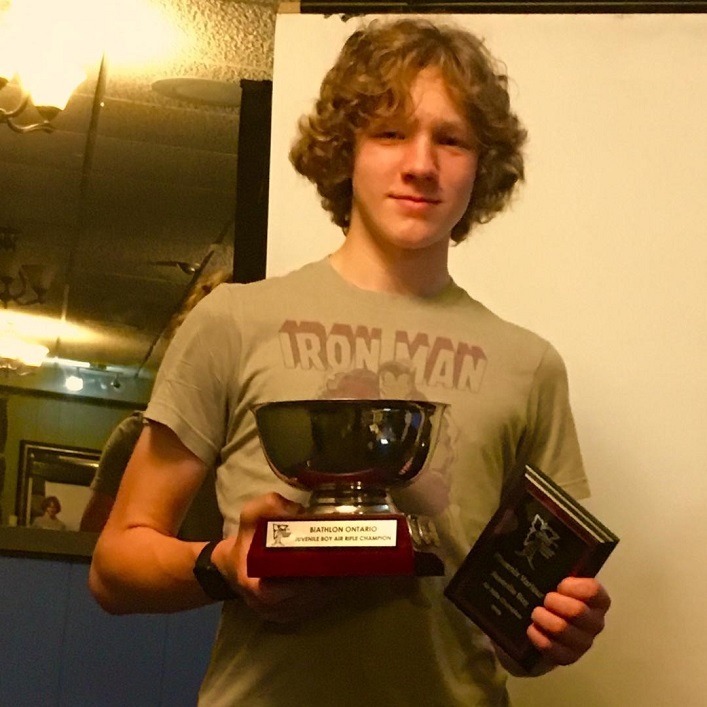 Phoenix Varieur with his Biathlon Ontario 2018/19 Juvenile Boy Air Rifle Champion award (Photo courtesy of Mike Varieur)