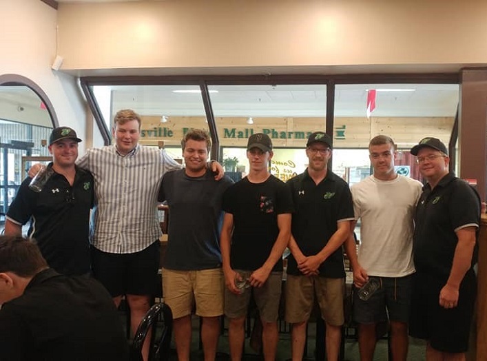 The team said thank you and good bye to the over-agers (from left) Sam Stewart, Mitch Jones, Cody Purvis and Cody Jones, who played their final season of LAX with the Junior C Hawks. Each player received a personalized mug.