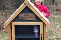 Morgan's daughter with the little lending library he built for the Muskoka Montessori School (supplied)