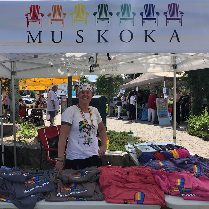 Volunteer Kate Quinlan selling merchandise