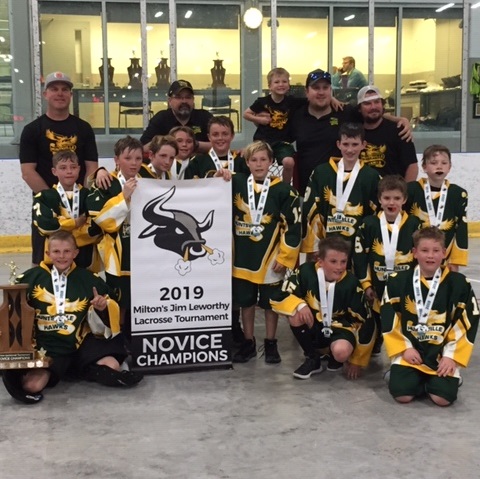 The Novice 1 Hawks also won this tournament in Milton (back row from left) coaches Ryan Woollings, Craig Frasier, Calvin Shirtliff, Frank Horvat, and Kory Shirtliff; (standing in middle row, from left) Landon Worrell, Carson Frasier, Taylor Carnduff, Nick Lagendyk, Logan Sheppard, Dylan Bennett, Tyson Olive, Wyatt Davidson, William Byers; (front row from left) Braeden Woollings, Avery Shirtliff, and Ryder Mackinnon. Missing from photo: Jake Earl