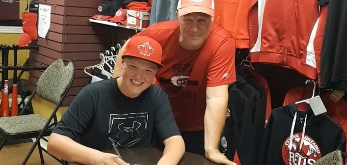 Lucas Allen signing to the Ontario Central Reds U14 AAA team (supplied)
