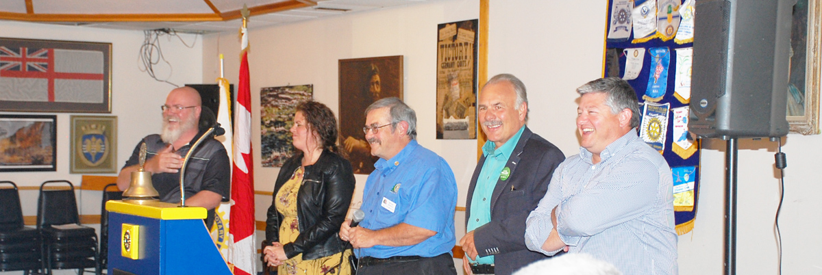 (From left) Tom Young (NDP), Trisha Cowie (Liberal), Rotarian Peter Redwood, Gord Miller (Green) and Scott Aitchison (Conservative) at the Legion on Wednesday