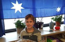 Daniel celebrating Australia day at St. Mary's on January 26 with a tray of lamingtons, an Australian treat (supplied)
