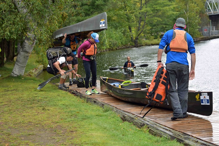 Paddlers prep for yet another portage