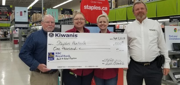 Kiwanis donates $1,000 to help kids with back-to-school supplies