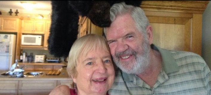 Val and Peter Rhead with a favourite teddy bear in the background (supplied)