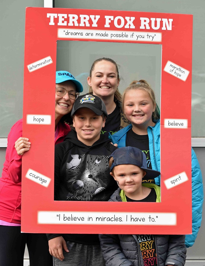 (From left) Vicky and Peter Perentesis with Carrie McClentic and her children Montana and Declan who love supporting the cause