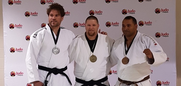 Jeff Allen (centre) with a gold from the Hatashita Ontario Open in Toronto (supplied)