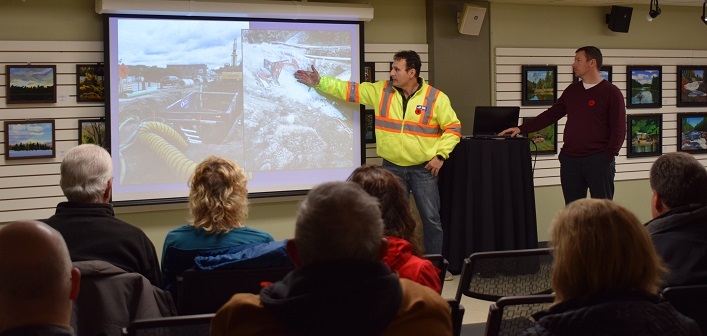 John Bravakis (left), J.B. Enterprises, and Mark Misko, District of Muskoka, talk to residents and business owners about some of the setbacks of the King William Street Project. (Mandi Hargrave)