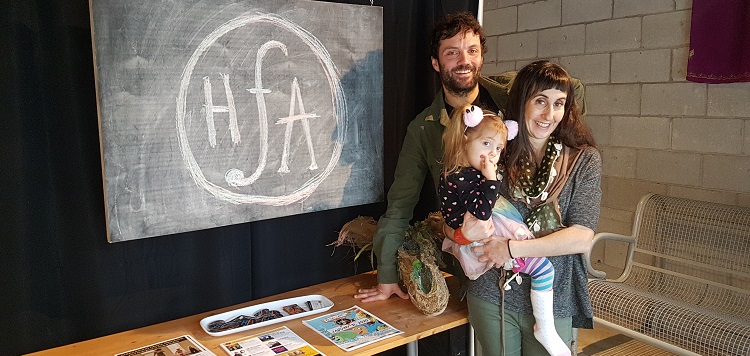 Dan Watson (back) and Christina Serra (holding Simone) in the HFA studio (Dawn Huddlestone)