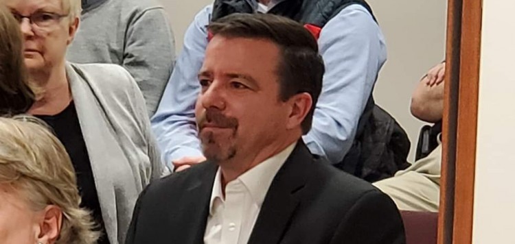Bob Stone sits in the gallery at the Feb. 11, 2020 special council meeting (Tamara de la Vega)
