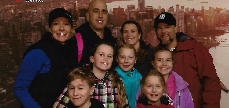 6 FLYOVER Canada photo of both families (supplied) cropped