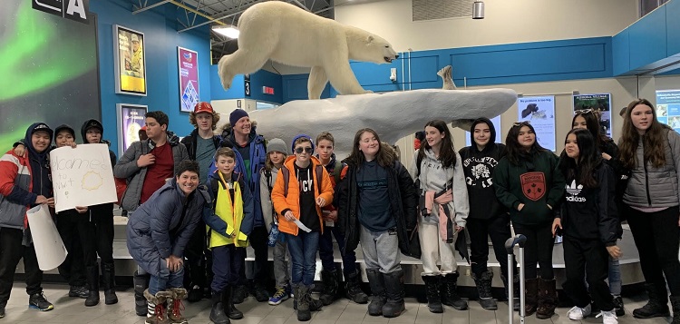 Tawingo students arrive in Yellowknife met by their friends from Deh Gáh (supplied)