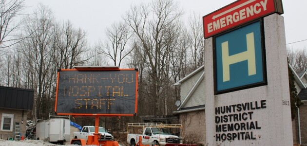Signs placed by anonymous residents thank hospital staff, grocery workers | Video