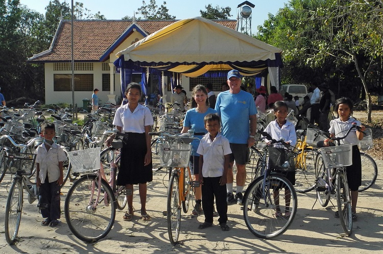 Carol and Will Gibson with some of the students they sponsored (supplied)