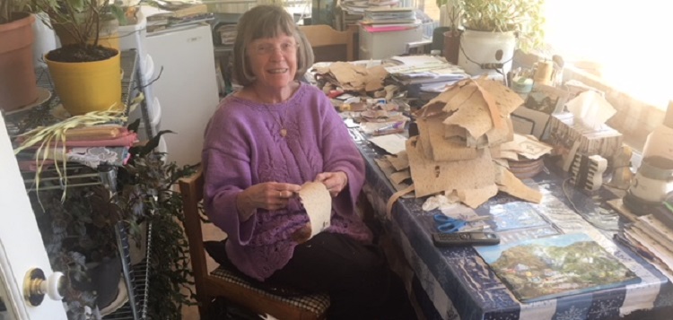 Frances Balodis sorting the birch bark she uses for her cards (supplied)