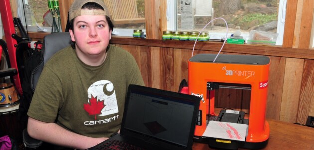 HHS student 3D printing earsavers for frontline mask wearers