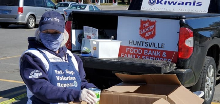 A Kiwanis Club of Huntsville Muskoka member collects donations at Metro on May 13, 2020 (Kiwanis Club of Huntsville Muskoka / Facebook)