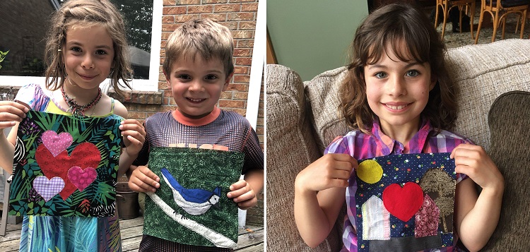 (From left) Isla Mathies, Simon Mathies, and Kathryn Sirek show off their isolation quilt squares (supplied)