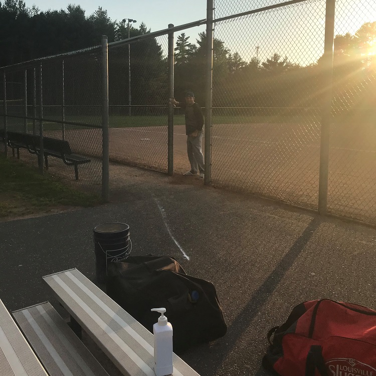 Muskoka Hornets 13U coach David Gemmell sanitizing Peake Field Diamond post workout (supplied)