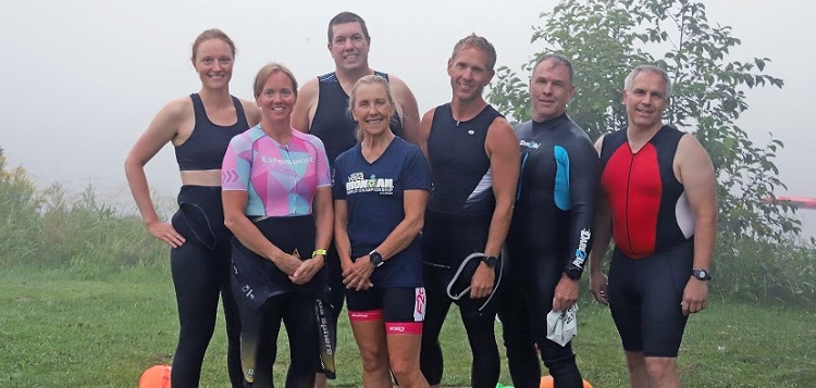 Jess Adam (second from left) organized a half-Ironman-like 70.3 mile triathlon (Don McCormick)