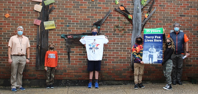 (From left) IMPS teacher Peter Yungblut, students John Chambers, Declan Mullins, Tye Brooks, and Island Webster, and principal Ian Patterson (Dawn Huddlestone)