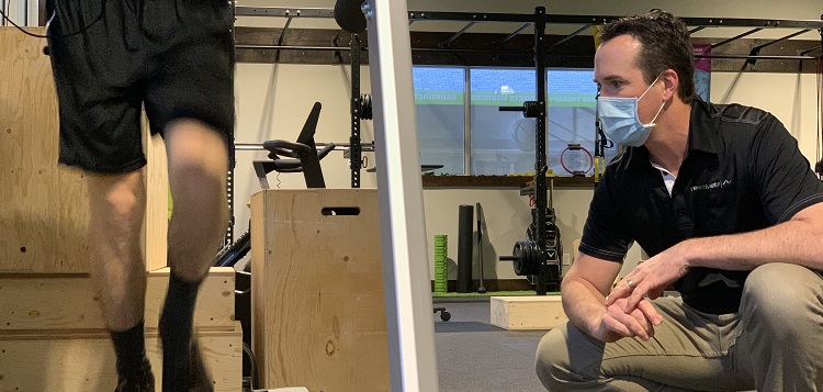 Dr. Rich Trenholm works with a patient at Reactivate Muskoka (supplied)