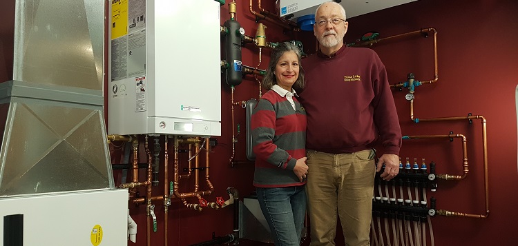 Elizabeth and Jan Sirek in the display room at Tasso Lake Heating Solutions (supplied)