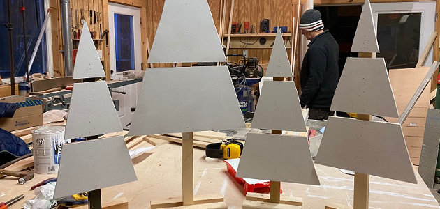 From scrap wood to holiday spirit: wooden trees supported The Table and helped create new memories