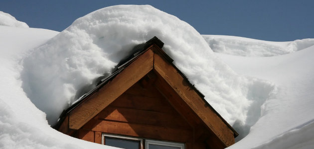Monitor snow loads on homes and other buildings: building department