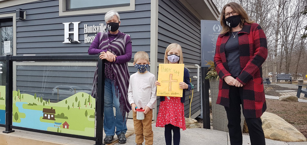 Oliver (second from left) and Paisley Fleming make a donation to Jennifer Simpson (left) development associate, and Trish Kruusmagi, development officer stewardship and events, from the Huntsville Hospital Foundation (supplied)