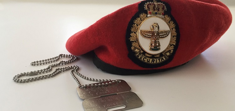Nancy Osborne’s beret and dog tags from her military service (submitted)