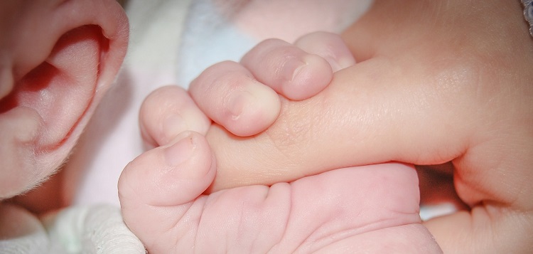 baby-holding-finger-Michal-Jarmoluk-Pixabay.jpg