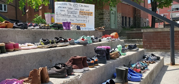 Shoes-at-Town-Hall-steps-honouring-215-children.jpg