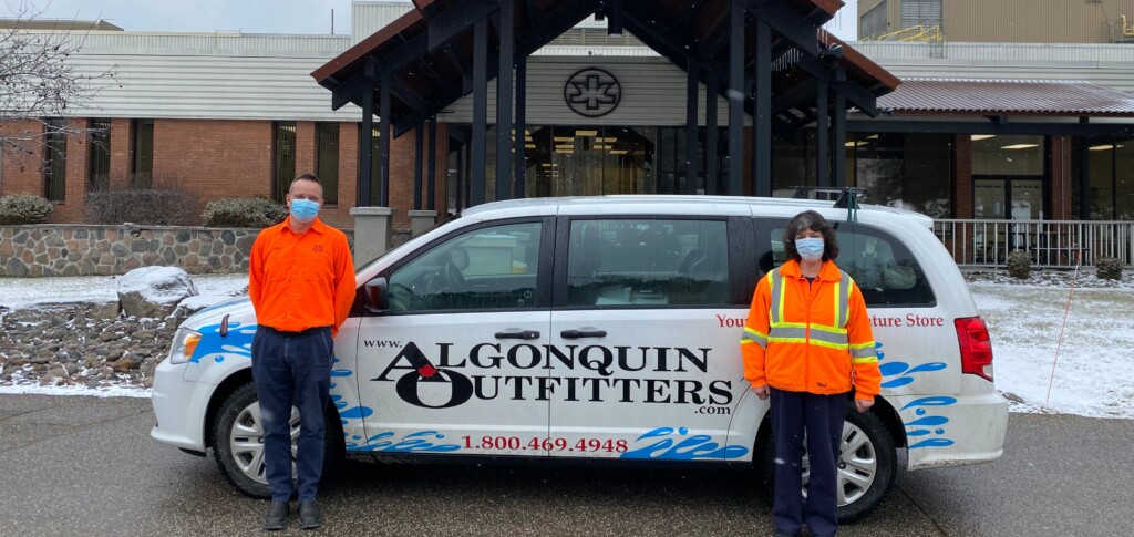 Ryler Reain (left) and Janice Paterson of Kimberly Clark. The company donated six boxes of coats for AO’s annual winter coat drive. (supplied)